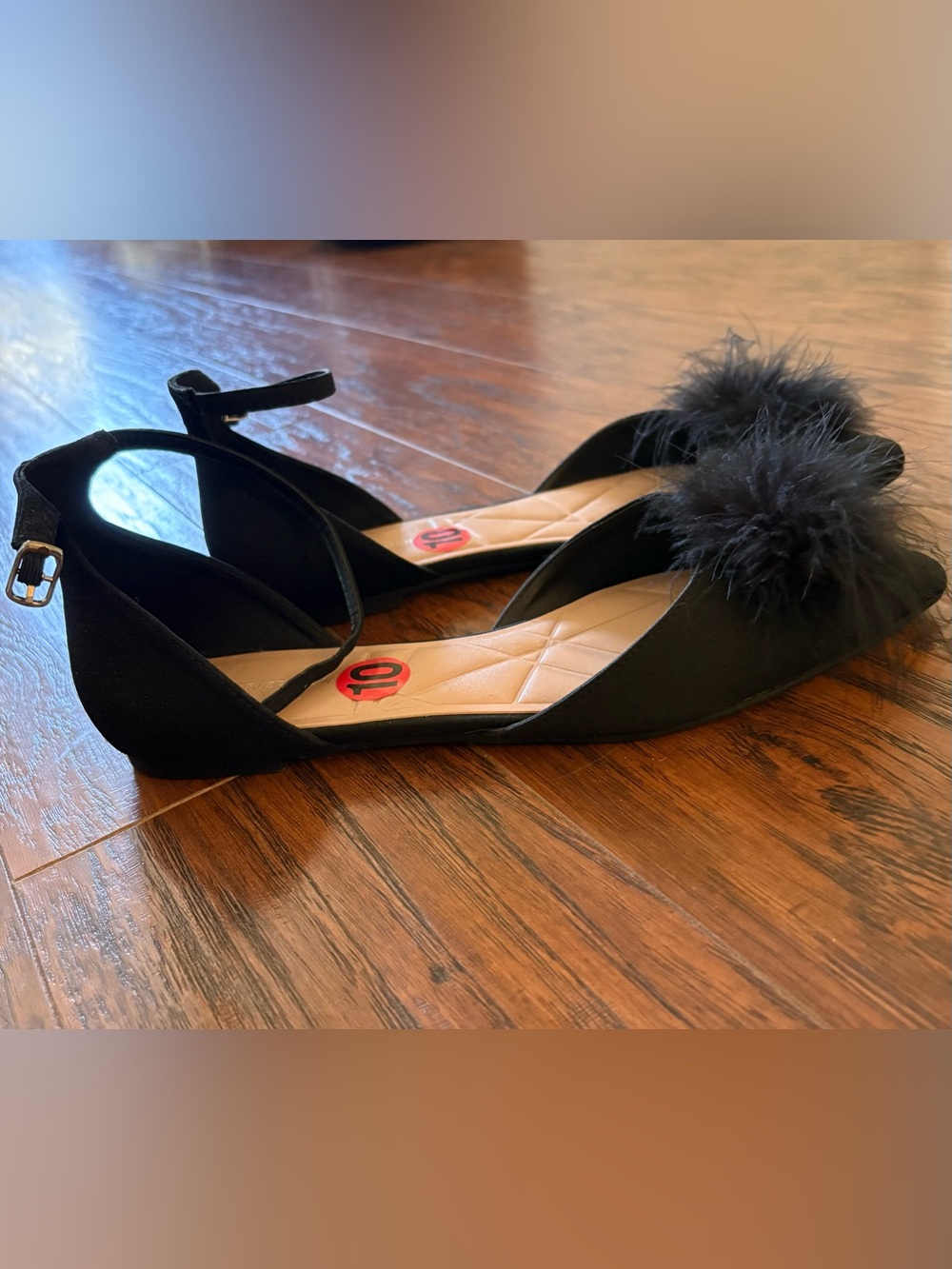 BCBGeneration Black Feather Pom Pointed Ankle-Strap Flats
